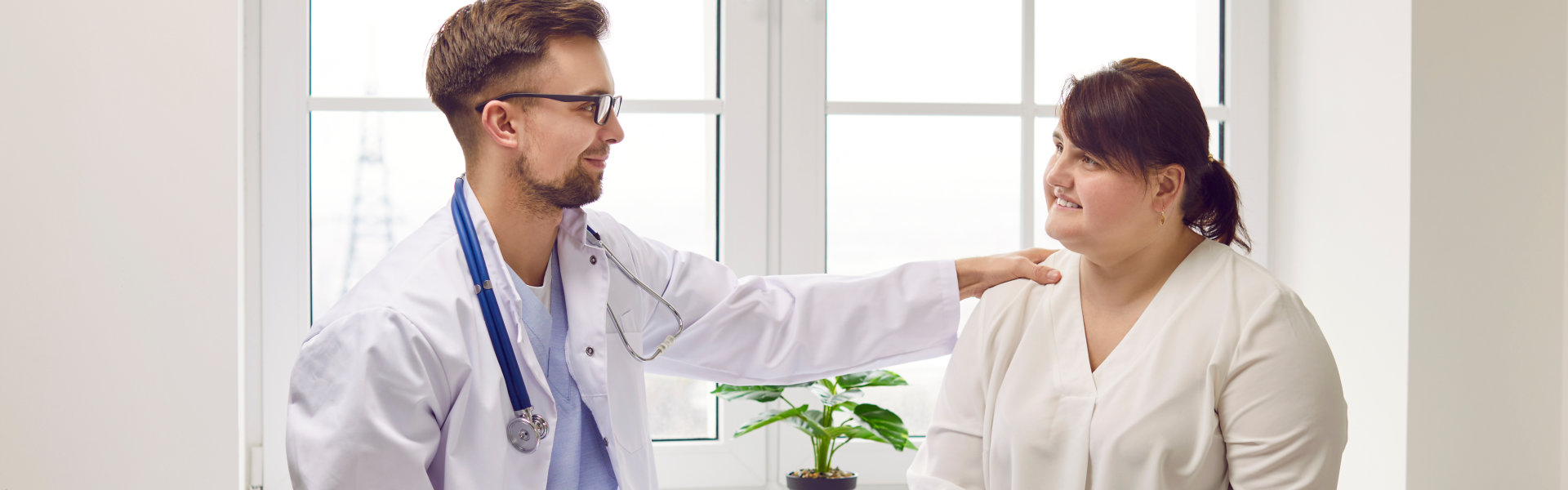 doctor comforting the woman